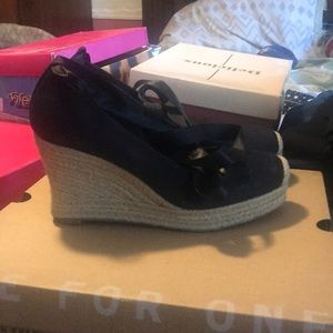 Woman’s black wedges size 5.5